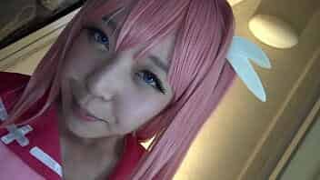 Beautiful cosplayer with pink hair who looks like she can do magic, dynamite body when she takes off her clothes video